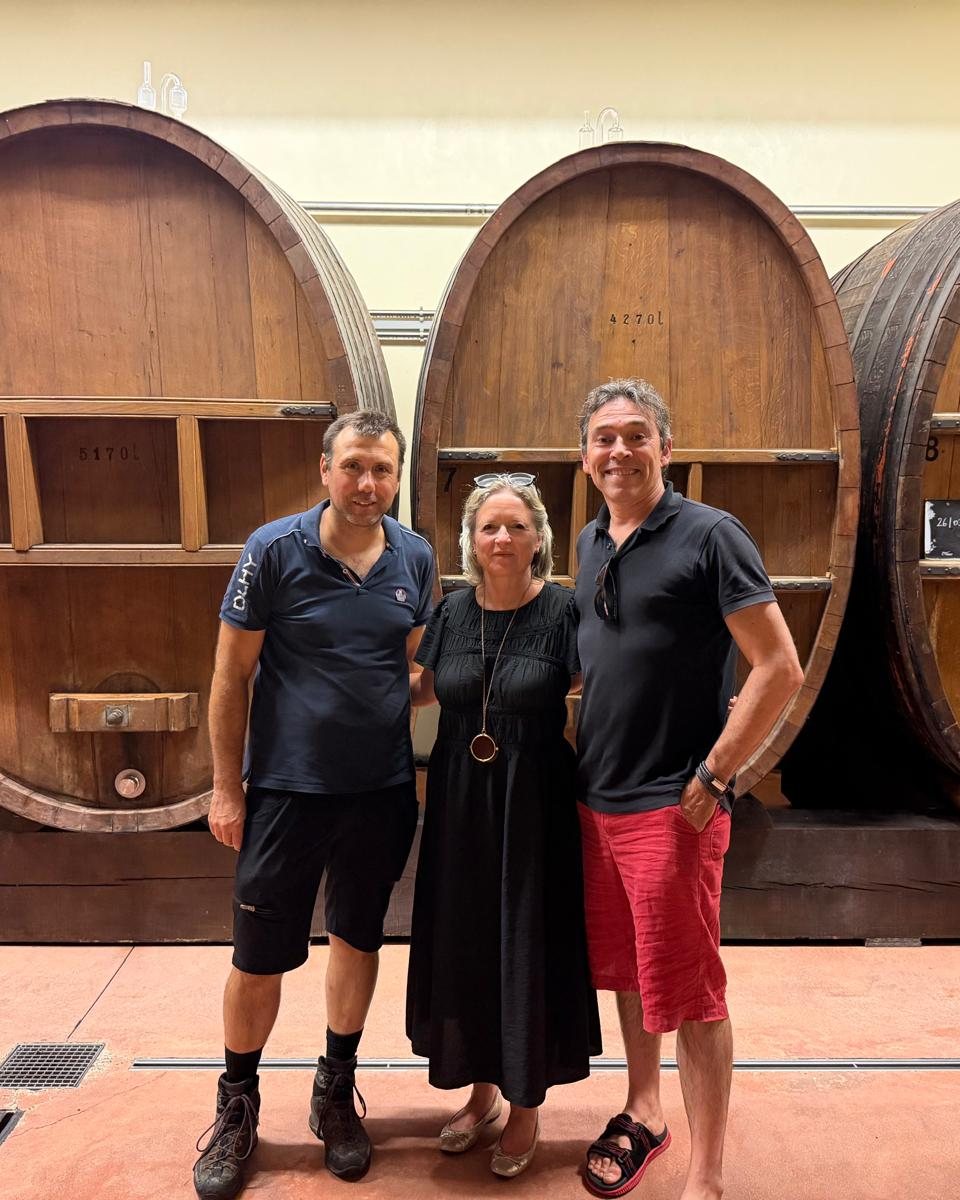 Amanda with Stéphane and Mickaël Moltès in front of the foudres
